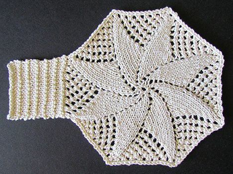 Knitted lace star motif knit from a Victorian era knitting pattern.