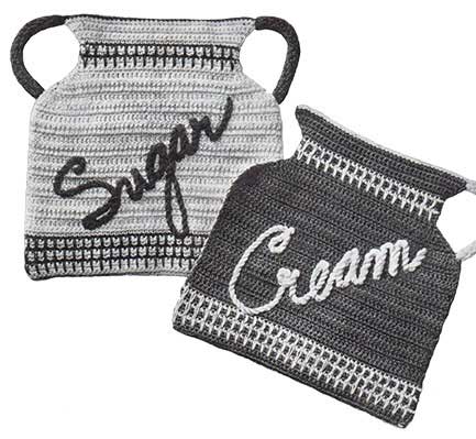 Potholders in the shape of a sugar pot and cream jug
