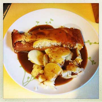 Toad in the hole. Sausages in Yorkshire pudding