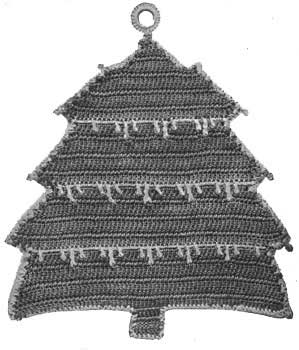 Potholder in the shape of a pine tree cpovered in snow