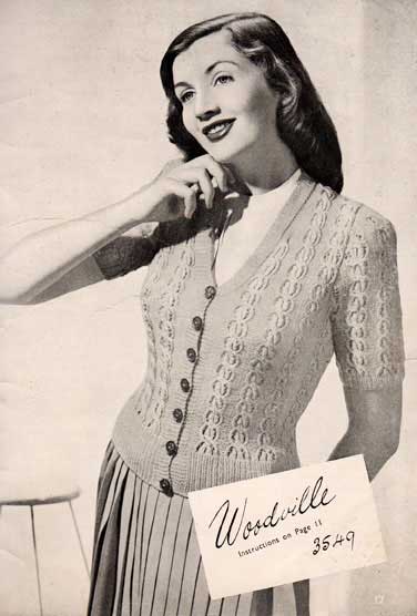 Fitted vintage cardigan with vertical lace and cable stripes. Long or short sleeves