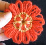 Loomed flower with crochet centre