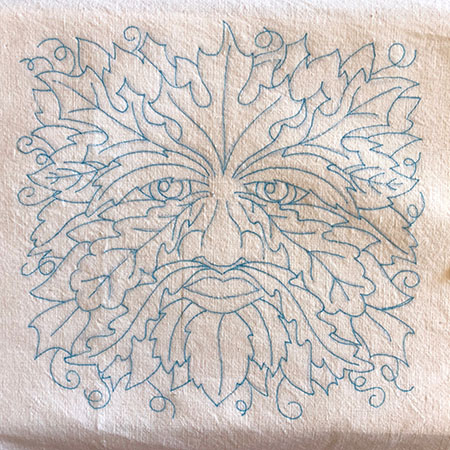 Green man embroidery design