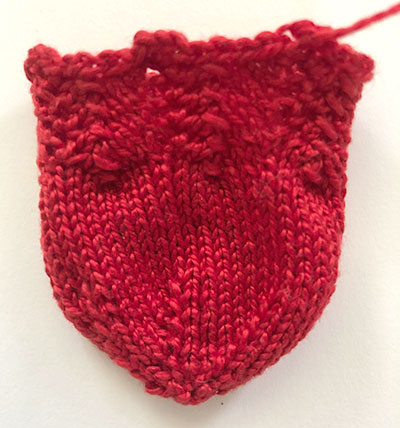 A red knitted berry.