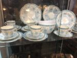 Blue and white china dinner service with a floral design